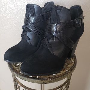 Black booties with 3 1/2 inch heel.